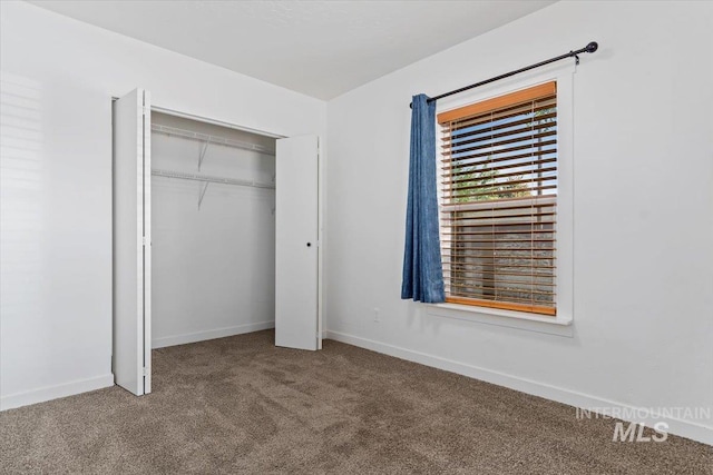 511 N 10th Ave N, Nampa, ID 83687 - unfurnished bedroom featuring carpet, a closet, and baseboards