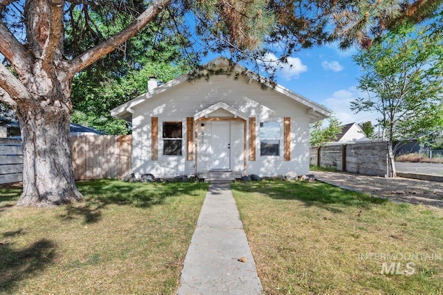 511 N 10th Ave N, Nampa, ID 83687 - bungalow-style home featuring a chimney