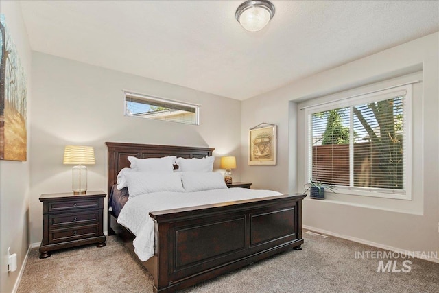9425 W Java Ct, Boise, ID 83704 - bedroom featuring light colored carpet and baseboards