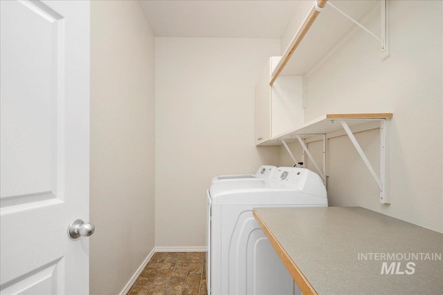 9425 W Java Ct, Boise, ID 83704 - washroom with washer and clothes dryer, baseboards, and stone finish floors