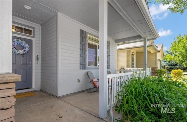 9425 W Java Ct, Boise, ID 83704 - doorway to property featuring covered porch