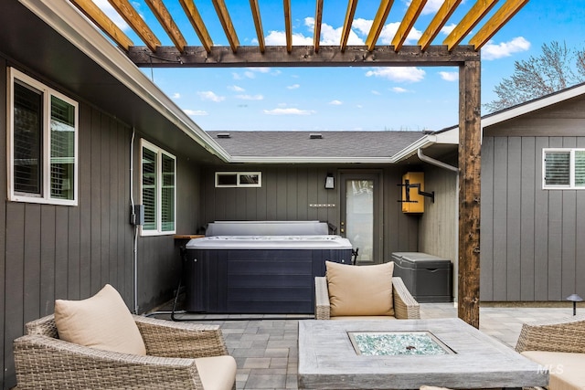 view of patio with a pergola, a hot tub, central AC, and an outdoor fire pit