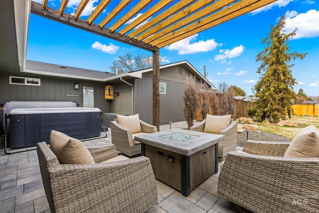 view of patio with central air condition unit, a hot tub, an outdoor living space with a fire pit, and fence