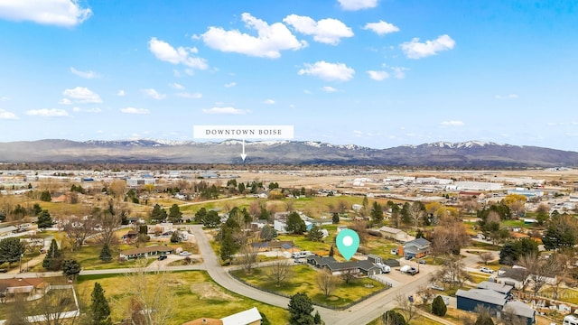 drone / aerial view with a residential view and a mountain view