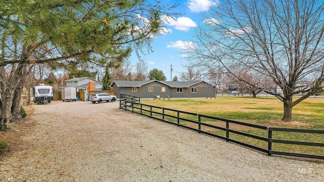 view of front of property featuring a fenced front yard and a front yard