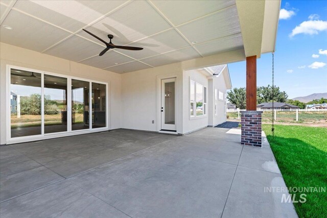 1360 Jordan Ln, Emmett, ID 83617 - view of patio / terrace with ceiling fan and a mountain view