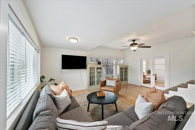 609 10th Ave S, Nampa, ID 83651 - living area with plenty of natural light, a ceiling fan, light wood-style flooring, and french doors
