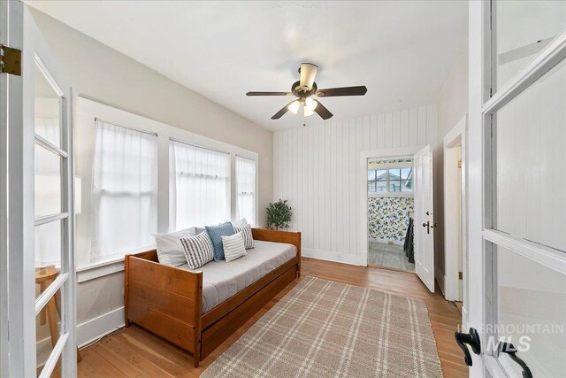 609 10th Ave S, Nampa, ID 83651 - living area featuring light wood-style flooring, baseboards, and ceiling fan