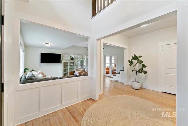 609 10th Ave S, Nampa, ID 83651 - entryway featuring light wood-style floors and stairway