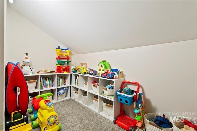 609 10th Ave S, Nampa, ID 83651 - playroom featuring vaulted ceiling and carpet flooring