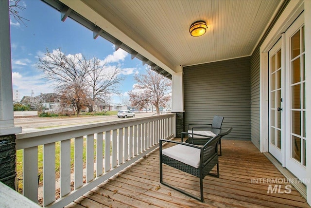 609 10th Ave S, Nampa, ID 83651 - deck with french doors and covered porch