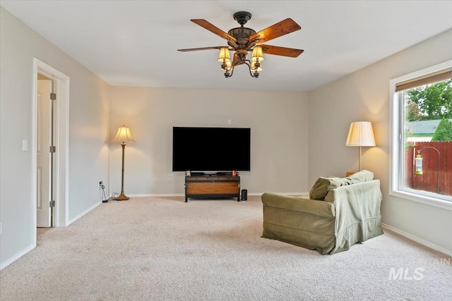 80 Cobblestone Ct, Middleton, ID 83644 - living room featuring carpet floors, a ceiling fan, and baseboards