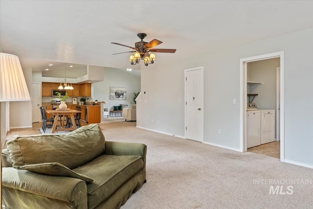 80 Cobblestone Ct, Middleton, ID 83644 - living area with washing machine and dryer, baseboards, light colored carpet, ceiling fan, and recessed lighting