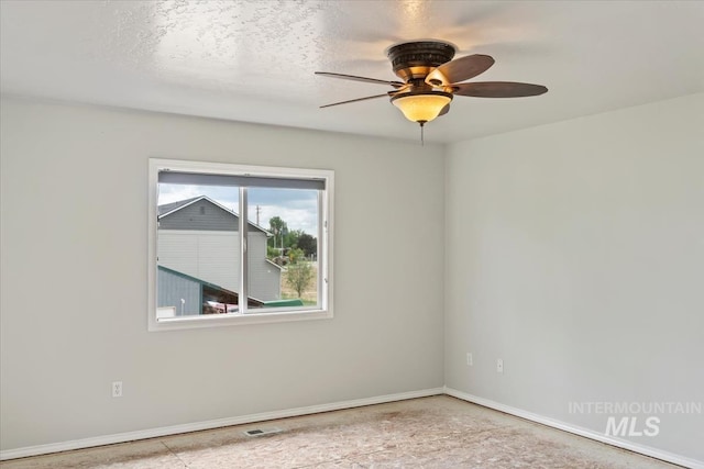 80 Cobblestone Ct, Middleton, ID 83644 - unfurnished room featuring baseboards and a ceiling fan