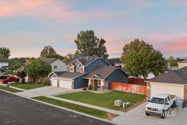 80 Cobblestone Ct, Middleton, ID 83644 - traditional-style home featuring concrete driveway, an attached garage, and a residential view