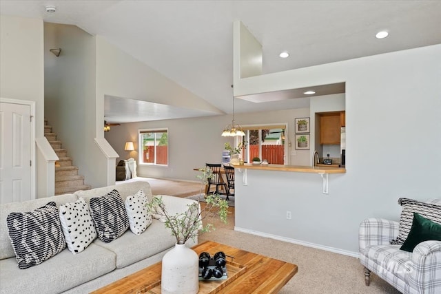 80 Cobblestone Ct, Middleton, ID 83644 - living room featuring light colored carpet, a chandelier, stairway, baseboards, and recessed lighting