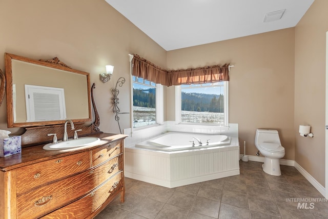 828 W Fork Eagle Creek Rd, Wallace, ID 83873 - full bathroom with vanity, a garden tub, and tile patterned floors