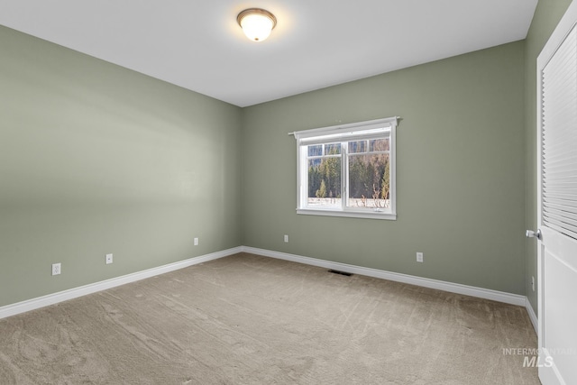 828 W Fork Eagle Creek Rd, Wallace, ID 83873 - empty room featuring carpet flooring and baseboards