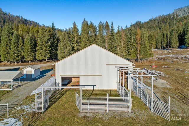 828 W Fork Eagle Creek Rd, Wallace, ID 83873 - view of pole building featuring a view of trees