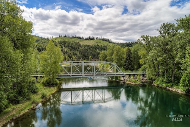 828 W Fork Eagle Creek Rd, Wallace, ID 83873 - water view featuring a forest and a notable bridge
