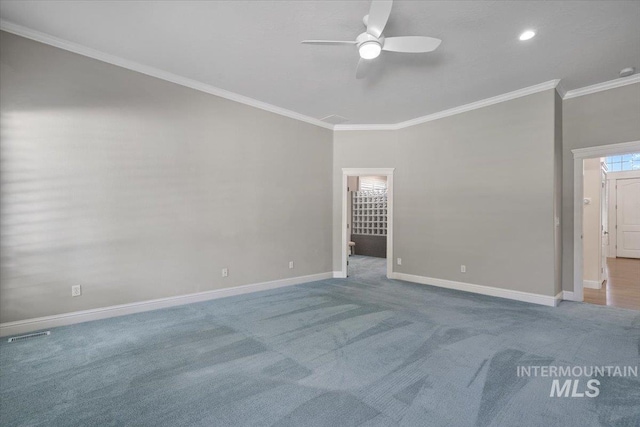 carpeted empty room with a ceiling fan, baseboards, crown molding, and recessed lighting