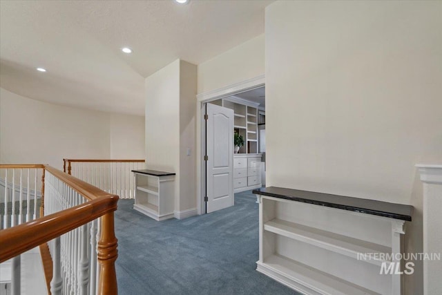 corridor with dark colored carpet, an upstairs landing, recessed lighting, and baseboards