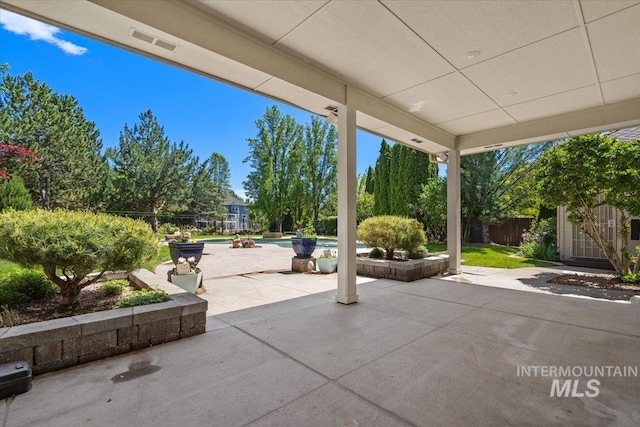 view of patio / terrace with fence