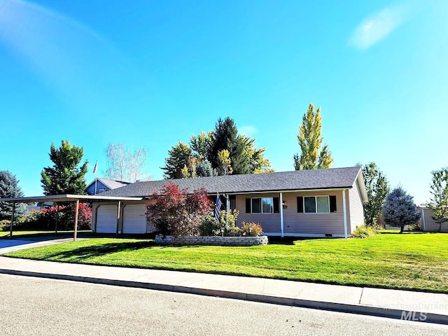 single story home featuring driveway, an attached garage, a front lawn, and a carport