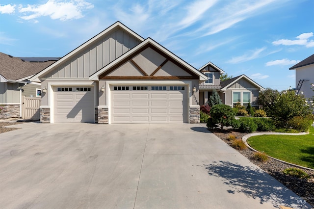 craftsman-style home featuring a garage