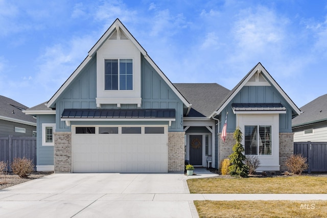 view of front facade featuring fence, board and batten siding, concrete driveway, roof with shingles, and brick siding