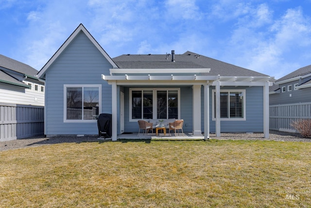 rear view of property with a patio, fence, a yard, a pergola, and a shingled roof