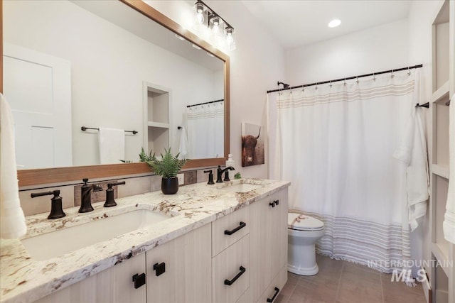 505 Stonehedge Loop, Twin Falls, ID 83301 - full bathroom featuring double vanity, tile patterned floors, and a shower with curtain