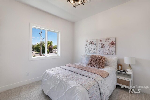 505 Stonehedge Loop, Twin Falls, ID 83301 - carpeted bedroom featuring baseboards