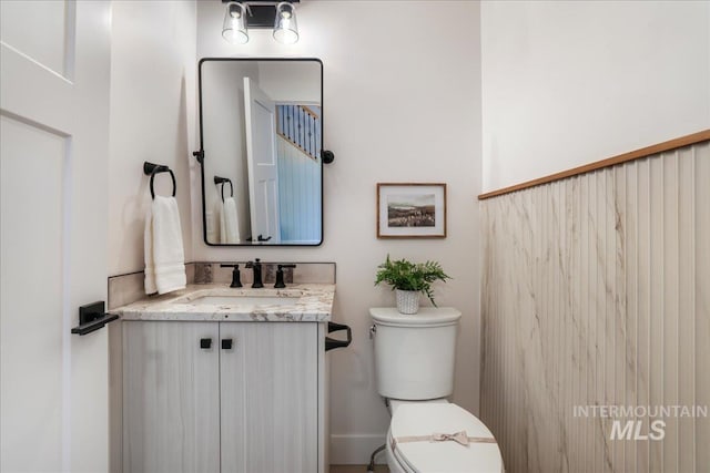 505 Stonehedge Loop, Twin Falls, ID 83301 - half bathroom with toilet and vanity