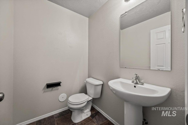 bathroom featuring toilet