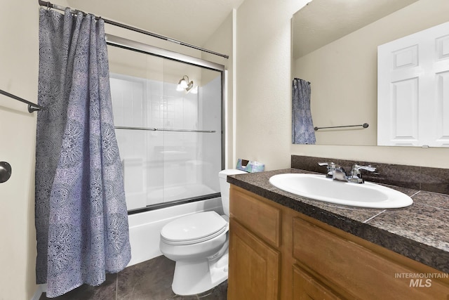 full bathroom featuring toilet, vanity, and combined bath / shower with glass door