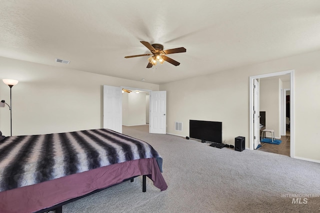 bedroom with carpet, ceiling fan, and baseboards