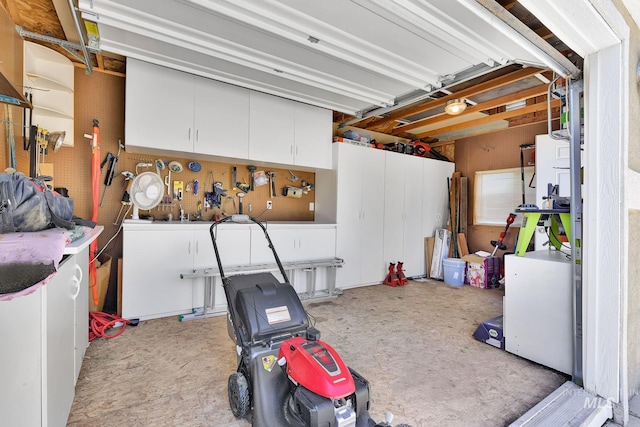 garage featuring a workshop area