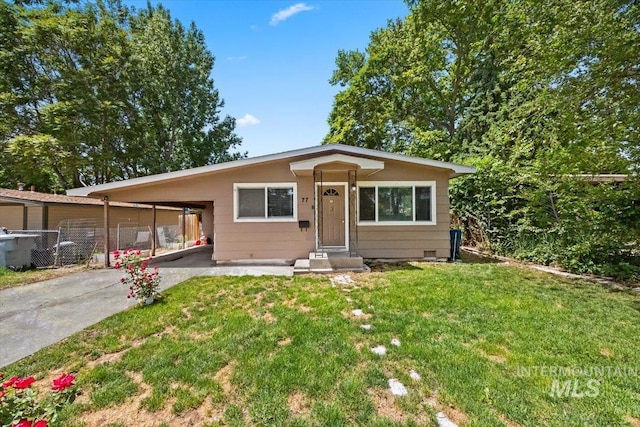 77 S Canyon St, Nampa, ID 83651 - view of front facade with driveway and a carport