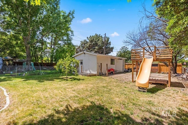 77 S Canyon St, Nampa, ID 83651 - fenced backyard featuring an outdoor structure