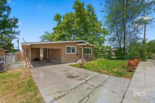 77 S Canyon St, Nampa, ID 83651 - view of front of home with driveway and an attached carport