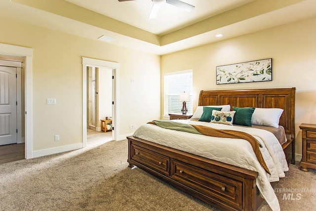 carpeted bedroom with ceiling fan