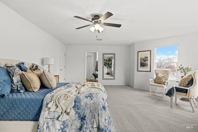 bedroom featuring visible vents, carpet flooring, a ceiling fan, and baseboards