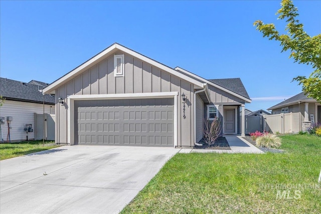 17719 Jackson Ridge Way, Nampa, ID 83687 - ranch-style house with board and batten siding, a garage, driveway, and a gate