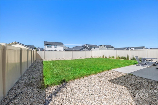 17719 Jackson Ridge Way, Nampa, ID 83687 - view of yard featuring a patio area and a residential view