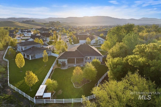 aerial view of residential area with a mountainous background