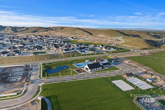 aerial overview of property's location with a mountain backdrop