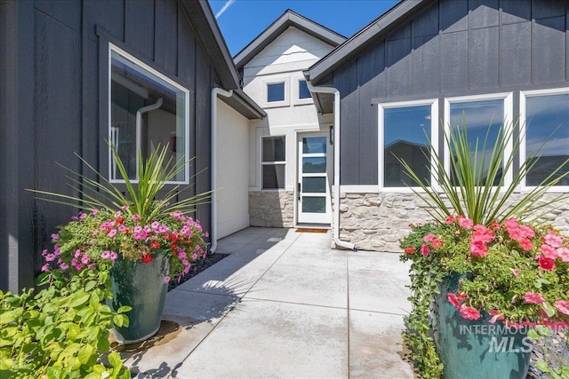 property entrance with a patio