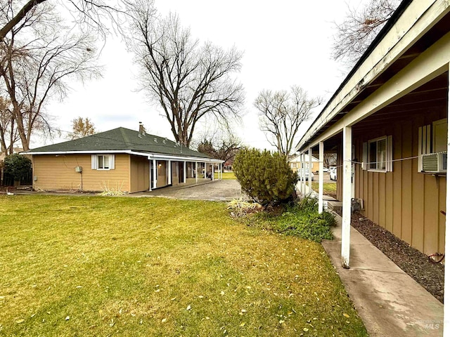 view of yard featuring a patio area and cooling unit