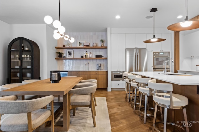 885 E Joplin Ln, Eagle, ID 83616 - dining area featuring light wood-type flooring and recessed lighting